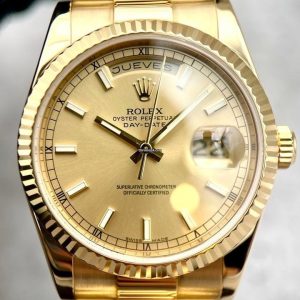 Rolex Day-Date 40 Yellow Gold Champagne Diamond Baguette Dial 228238